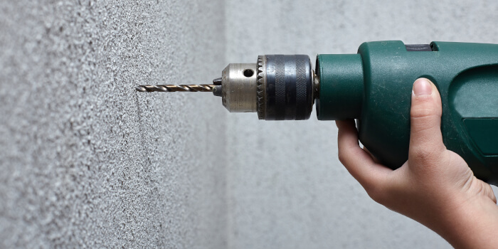 Drilling into a wall